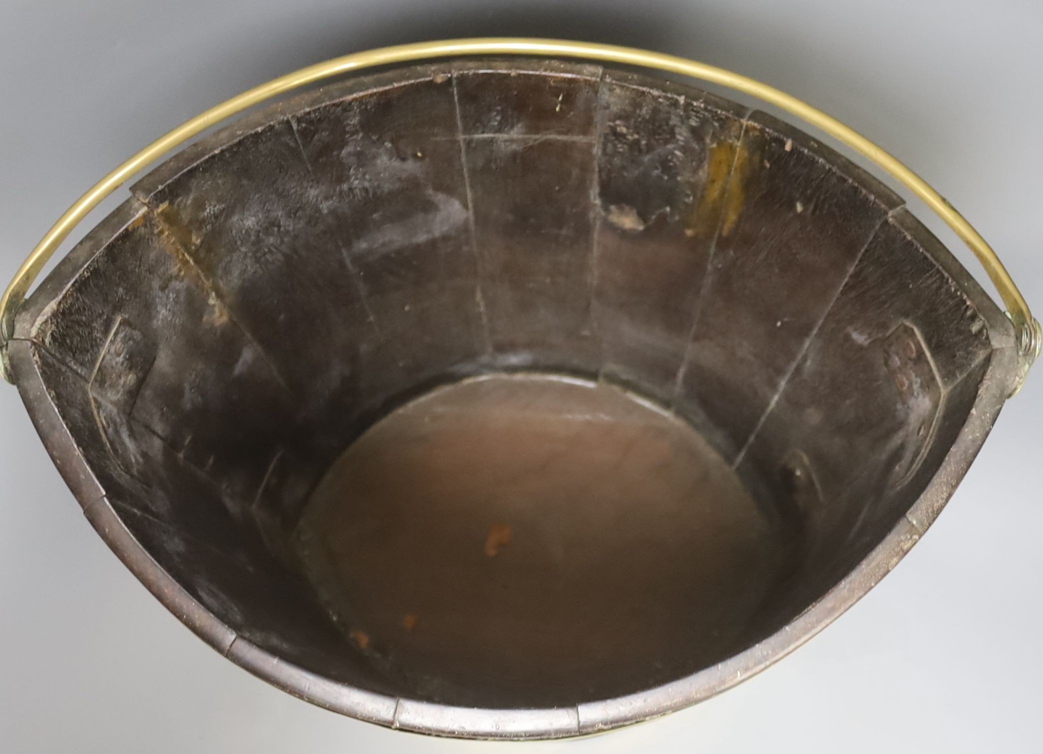 An early 19th century Dutch mahogany and brass bound oyster or peat bucket 33cm